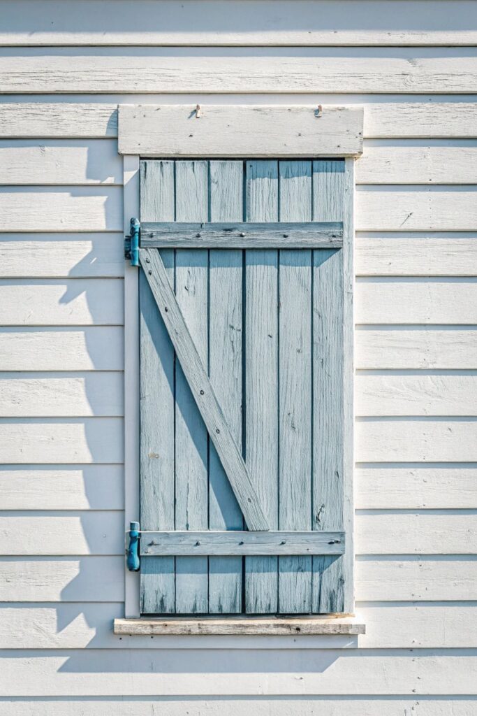 Rustic Charm of Board and Batten Exterior Window Shutters